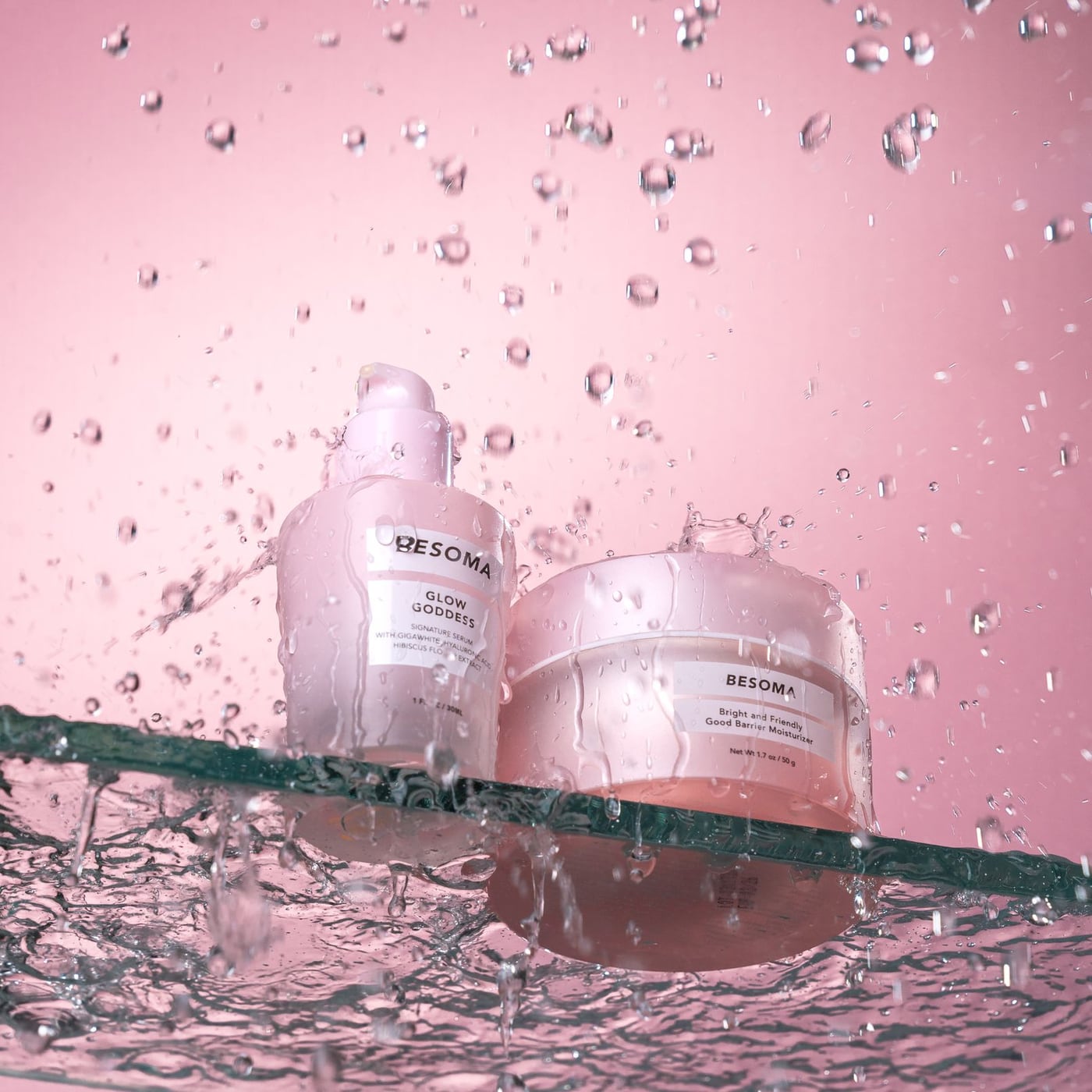 Close-up of skincare products with professional studio lighting on reflective surface